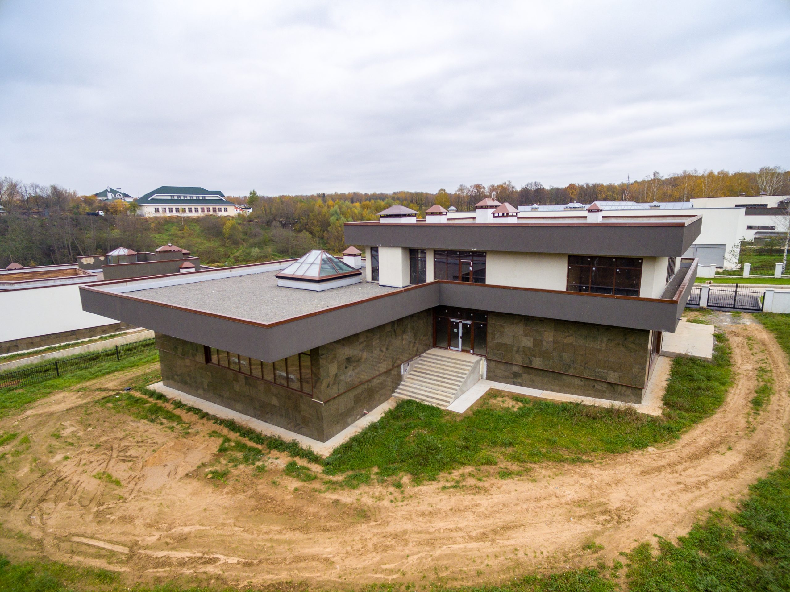 Modern country houses under construction as seen from air